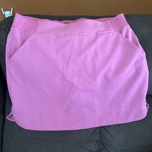 Super cute workout skirt with built in shorts.